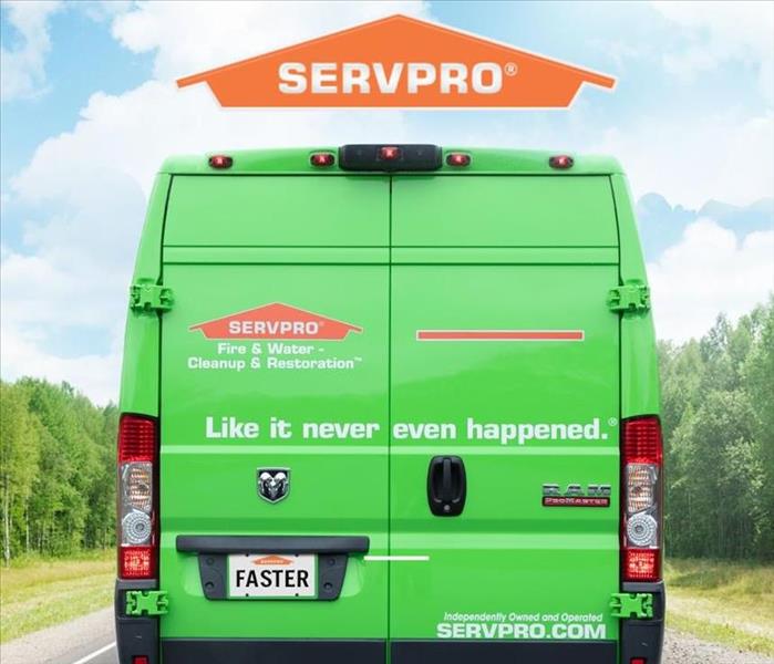 faster to any size disaster - image of green SERVPRO vehicle on road