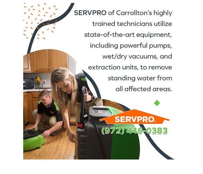 SERVPRO technicians using advanced equipment to restore a kitchen that has suffered water damage