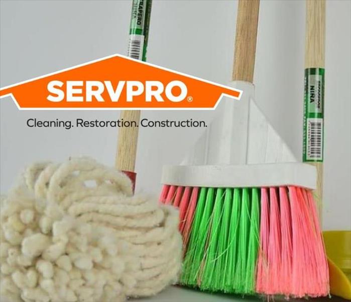 SERVPRO logo and brooms and mops